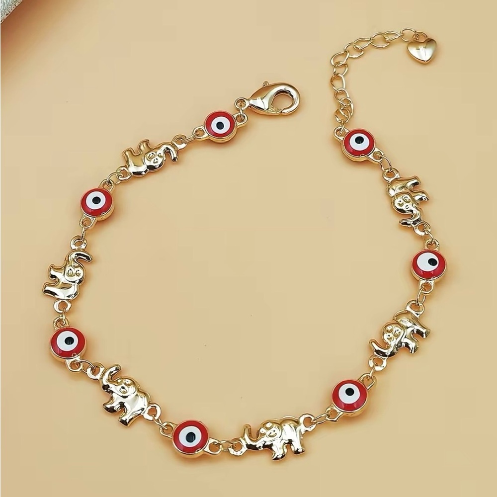 Fashion Jewelry Gold Elephant Bracelet with Red and White Eye Charms